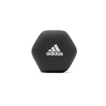 Black hexagonal Adidas dumbbell with white logo on white background