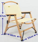 Beige canvas and wooden frame camping chair with armrests, 67cm height, 56cm width, 55cm depth