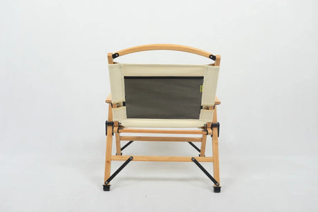 Back view of beige canvas folding chair with bamboo frame and mesh backrest on white background
