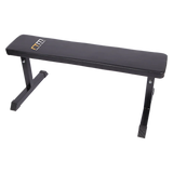 Black flat weight bench with metal frame for home gym workouts