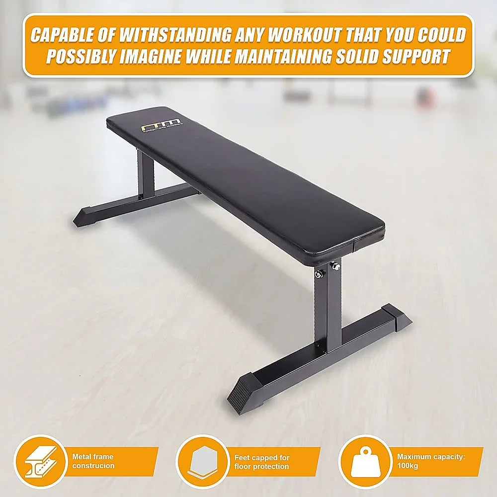 Flat weight bench with black padding, metal frame, gym background, workout bench features