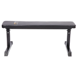 Black flat weight bench with sturdy steel frame for gym or home workout.