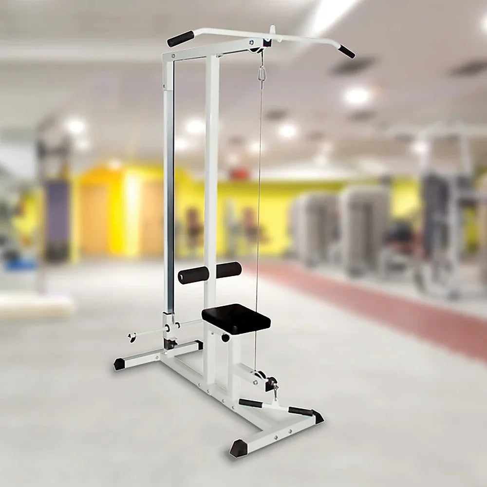 White lat pulldown machine with black seat in a modern gym setting