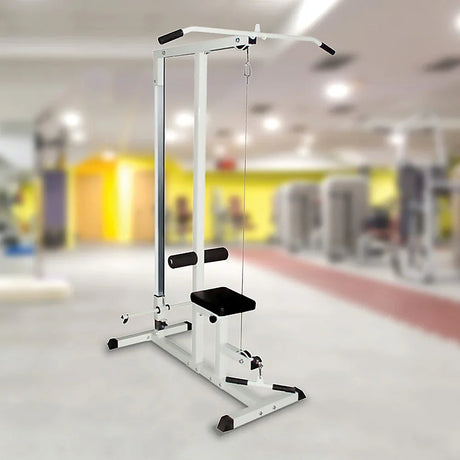 White lat pulldown machine with black seat in a modern gym setting