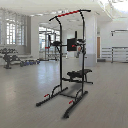 Multifunction power tower workout station in a modern gym with weights and benches