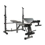 Adjustable weight bench with leg developer and preacher curl pad for home gym workouts