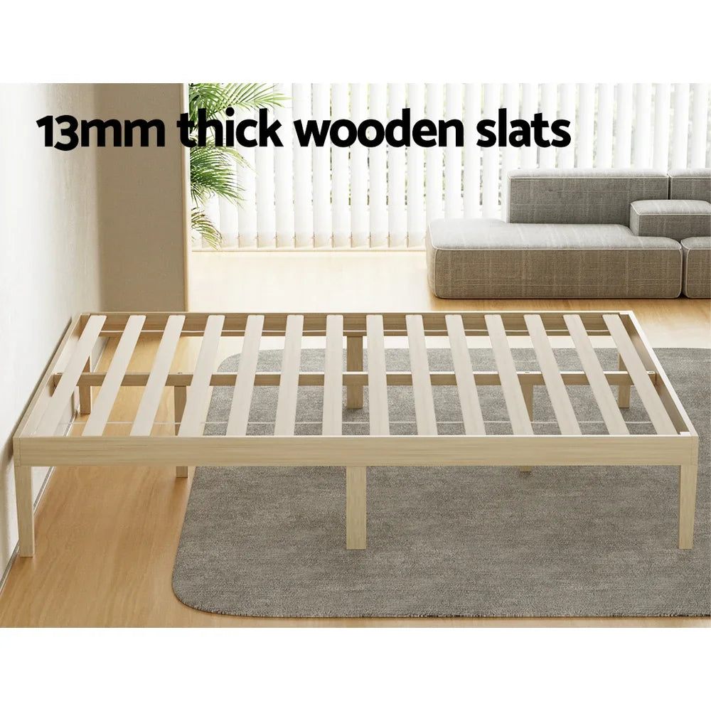 Minimalist wooden bed frame with 13mm thick wooden slats in a modern living room