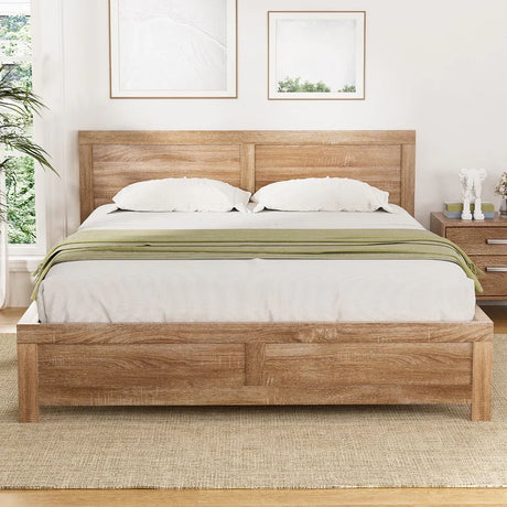 Modern farmhouse bedroom with wooden bed frame, beige bedding, green throw, and nightstand